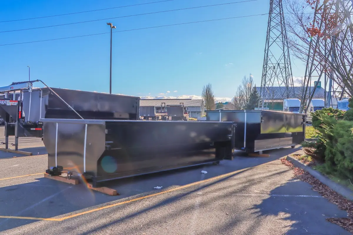 Roll-off dumpster ready for waste disposal at job site for Construction Dumpster Rental in Angleton